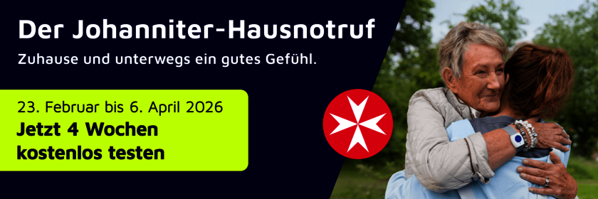 Ältere Frau umarmt eine Pflegekraft im Freien; Werbebanner mit dunkelblauem und neon-gelbem Bereich, Text zur Johanniter-Hausnotruf-Aktion und Hinweis auf 4 Wochen kostenlos testen.
