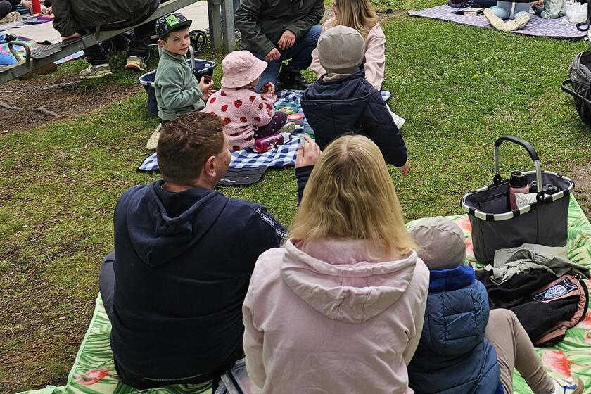 Eltern mit ihren Kindern