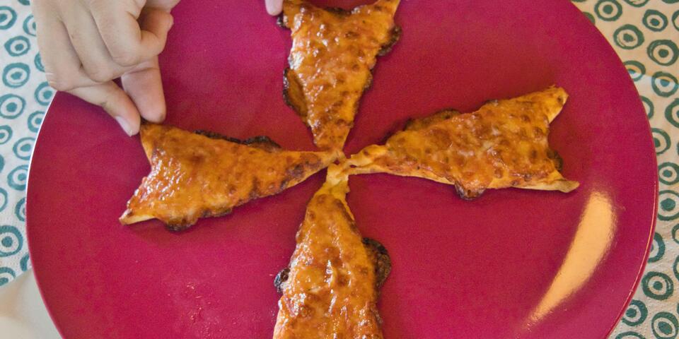 Pizza als Johanniter-Emblem